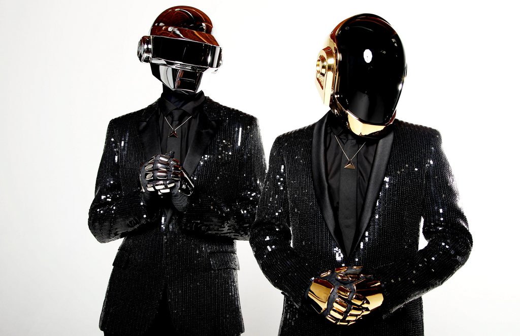In this April 17, 2013 photo, Thomas Bangalter, left, and Guy-Manuel de Homem-Christo, from the music group, Daft Punk, pose for a portrait in Los Angeles.  The electronic duo's new studio album, "Random Access Memories" releases in the US on May 21, 2013. (Photo by Matt Sayles/Invision/AP)