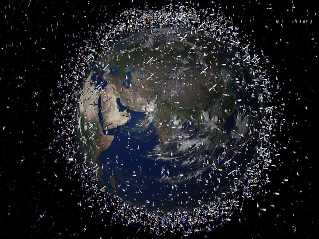 En près de 60 ans d'activité spatiale, environ 42'000 objets de plus de 10 centimètres gravitent autour de la Terre, formant un nuage de déchets. Ici une vue d'artiste générée par ordinateur et fournie par l'Agence spatiale européenne (archives).