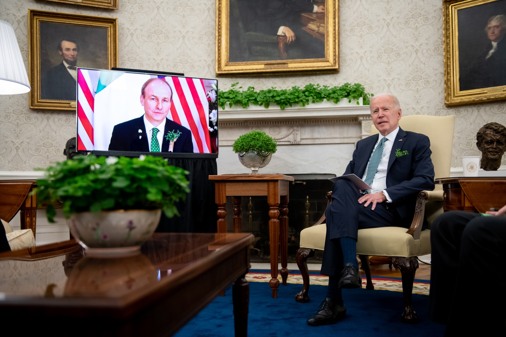 epa09080445 US President Joe Biden participates in a virtual bilateral meeting with Ireland's Prime Minister Micheal Martin in the Oval Office at the White House in Washington, DC, USA, 17 March 2021. EPA/ERIN SCOTT / POOL