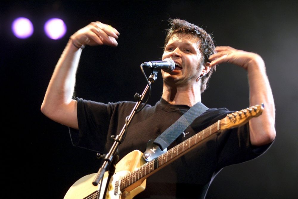 French singer Bertrand Cantat of rock group Noir Desir performs during the Paleo Festival, Nyon, Switzerland, on Friday, July 29, 2000.  (KEYSTONE/Fabrice Coffrini)