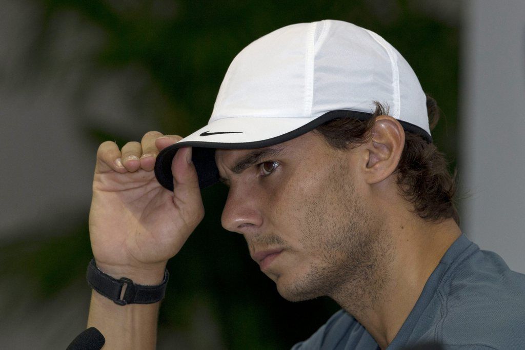 Spain's Rafael Nadal attends a press conference for the Shanghai Masters tennis tournament at the Qizhong Forest Sports City Tennis Center, in Shanghai, China, Tuesday, Oct. 8, 2013. (AP Photo/Ng Han Guan)