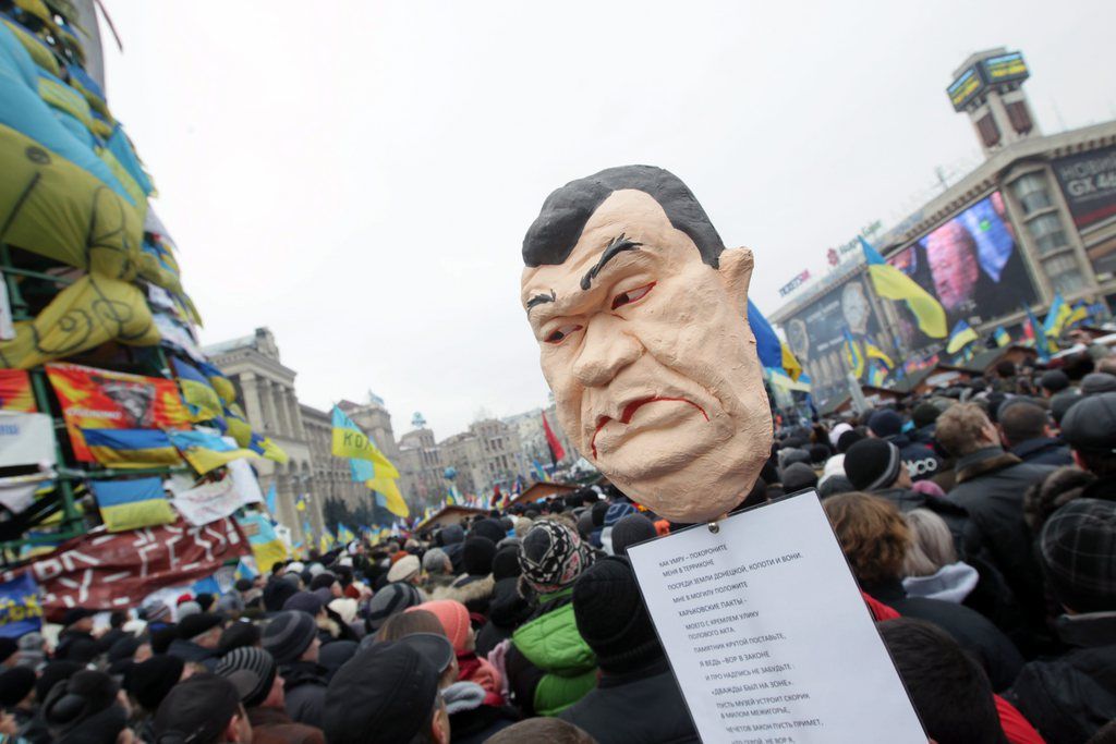Les manifestants dans les rues de Kiev dimanche.