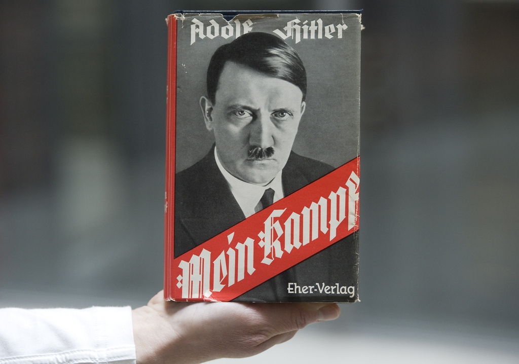 Adolf Hitler's infamous memoir "Mein Kampf" is presented during a news conference in Nuremberg, southern Germany, Tuesday, April 24, 2012. The state of Bavaria that owns the copyrights plans to publish "Mein Kampf"  with critical commentary. (AP Photo/dapd, Lennart Preiss)