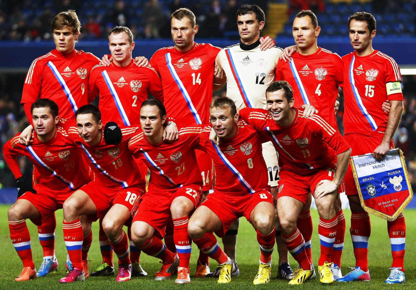 La sélection russe se retrouve privée de son capitaine (n° 15).

Picture taken on 25 March 2013 shows Russian national soccer team players (front row, L-R) Viktor Faizulin, Vladimir Bystrov, Andrey Yeshchenko, Denis Glushakov and Aleksandr Kerzhakov; (back row, L-R) Aleksandr Kokorin, Aleksandr Anyukov, Vasili Berezutski, goalkeeper Vladimir Gabulov, Sergei Ignashevich and captain Roman Shirokov posing for photographers before the international friendly soccer match between Brazil and Russia at Stamford Bridge in London, Britain. Team Russia is among the 32 squads that qualified for the FIFA World Cup 2014 in Brazil.  EPA/KERIM OKTEN *** Local Caption *** 50769202