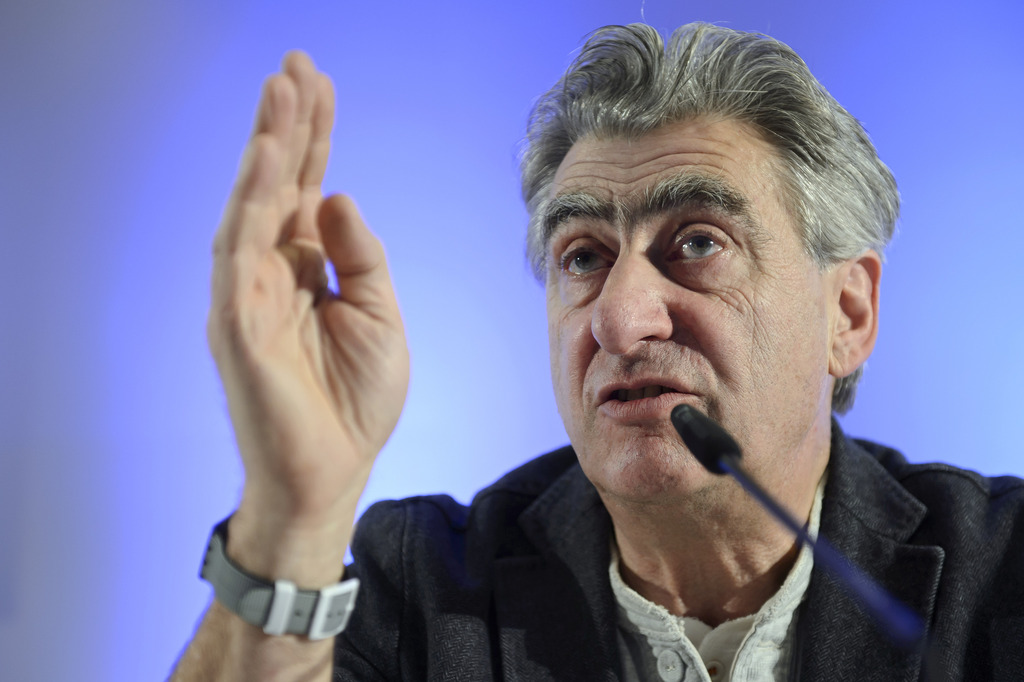 CEO of Swiss watch company Swatch Group, Nick Hayek, speaks during a press conference about the year 2013 final results presentation, Thursday, March 20, 2014, in Geneva, Switzerland. (KEYSTONE/Martial Trezzini)