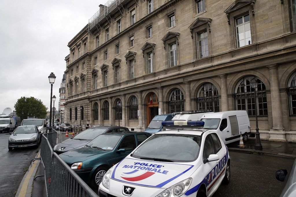 View of the 36 Quai des Orfevres police building in Paris, Saturday, April 26, 2014. A judicial official says four police officers are in custody after a woman reported that she was raped inside Paris police headquarters. (AP Photo/Christophe Ena)