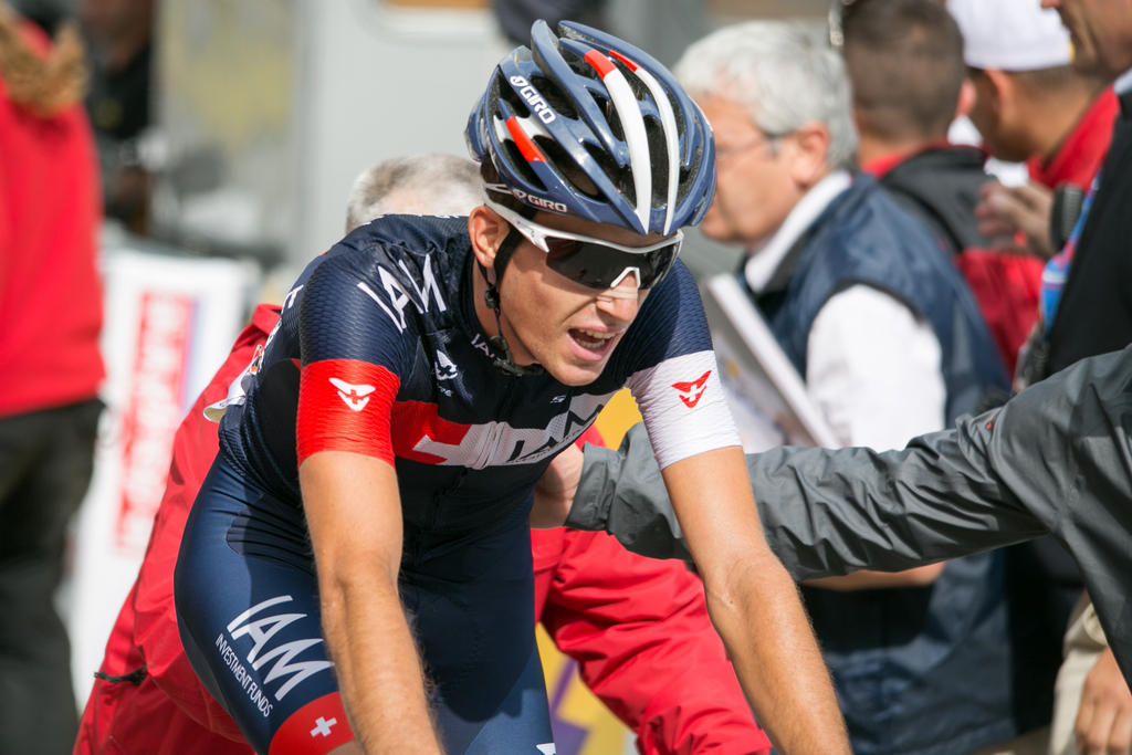 Swiss Sebastien Reichenbach of team IAM Cycling crosses the finish line in 10th position during the 7 stage, a 160 km race from Ville-la-Grand to Finhaut - Emosson at the 66th "Criterium du Dauphine" UCI ProTour cycling race near Finhaut Emosson, Switzerland, Saturday, June 14, 2014. (KEYSTONE/Etienne Bornet)