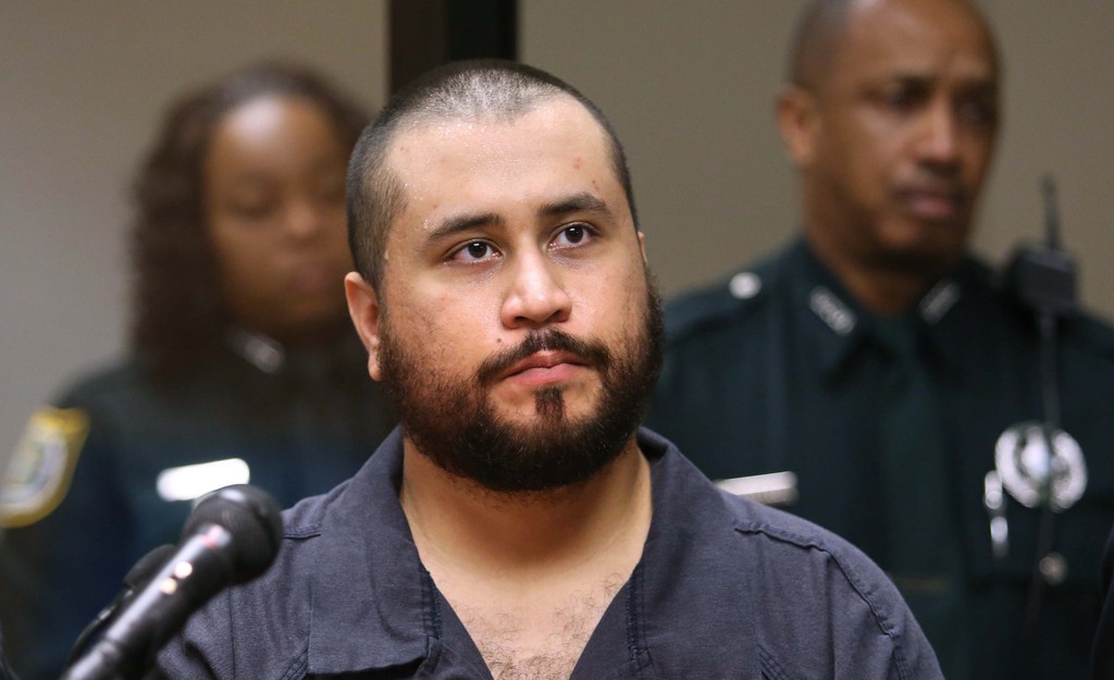 FILE - In this Tuesday, Nov. 19,  2013, file photo, George Zimmerman, acquitted in the high-profile killing of unarmed black teenager Trayvon Martin, listens in court, in Sanford, Fla., during his hearing on charges including aggravated assault stemming from a fight with his girlfriend. Prosecutors announced Wednesday, Dec. 11, 2013, that they will not file domestic violence charges against Zimmerman. (AP Photo/Orlando Sentinel, Joe Burbank, Pool, File)