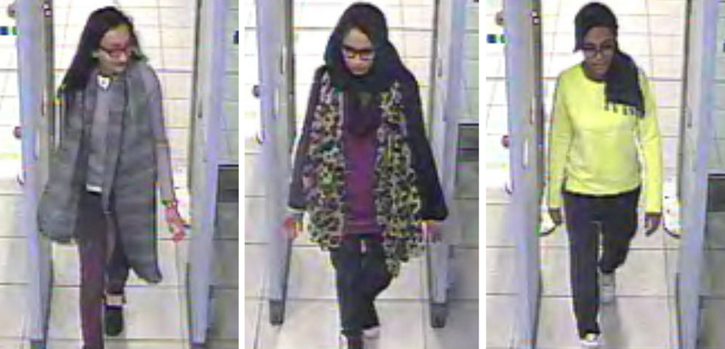 This is  three image combo of stills taken from CCTV issued by the Metropolitan Police in London on Monday Feb. 22, 2015,  Kadiza Sultana,16, left,  Shamima Begum,15, centre and  and 15-year-old Amira Abase going through security at Gatwick airport, before they caught their flight to Turkey on Tuesday Feb 17, 2015. The three teenage girls  left the country in a suspected bid to travel to Syria to join the Islamic State extremist group.(AP Photo/Metropolitan Police) NO ARCHIVE