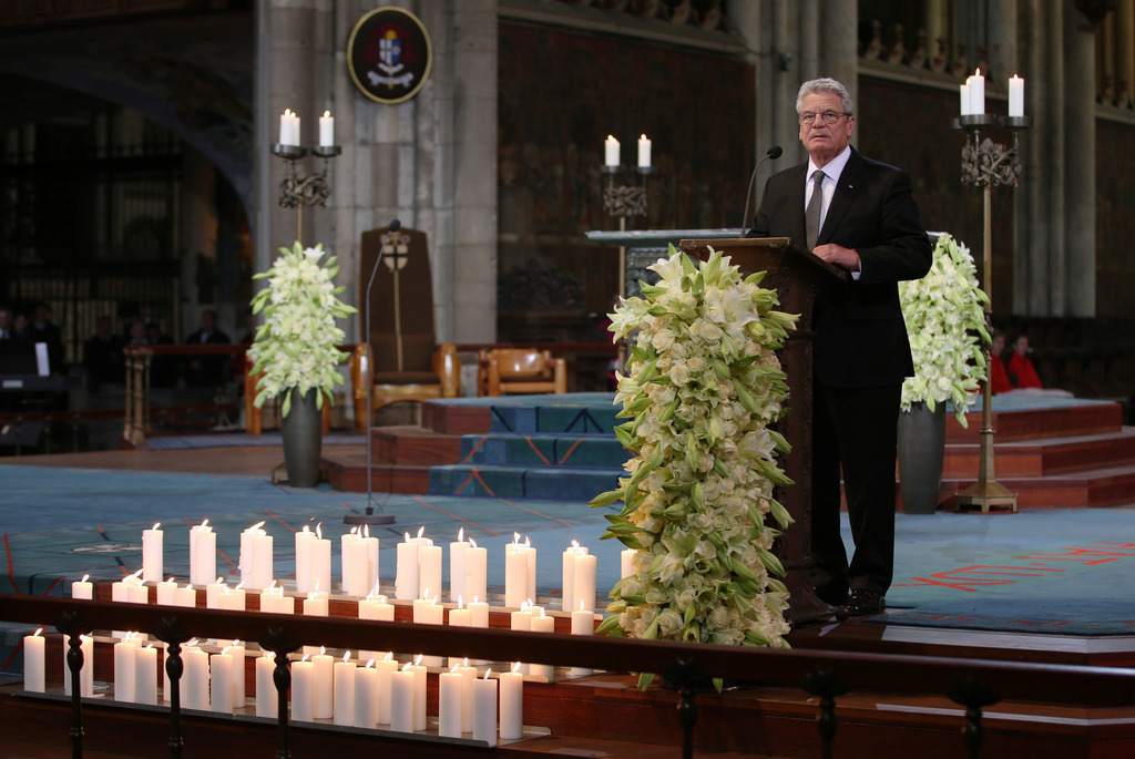 German President Joachim Gauck delivers a speech during a mourning ceremony at the Cathedral in Cologne, Germany, Friday, April 17, 2015.  A mourning ceremony is held in the Cathedral in memory of the 150 victims of the Germanwings plane crash in the French Alps last month. (Oliver Berg/Pool Photo via AP)