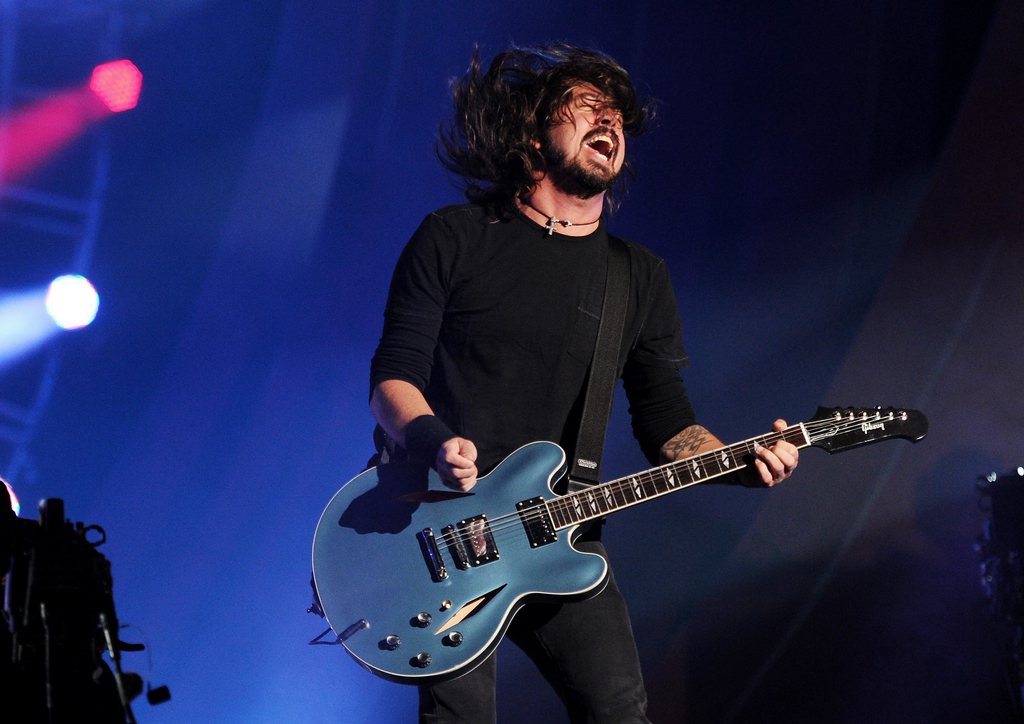 Musician Dave Grohl and the Foo Fighters perform at the Global Citizen Festival in Central Park on Saturday Sept. 29, 2012 in New York. (Photo by Evan Agostini/Invision/AP)