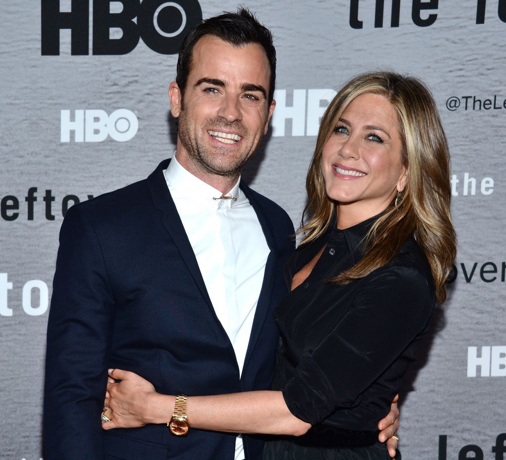 Jennifer Aniston, right, and Justin Theroux arrive at NY Season Premiere of HBO's "The Leftovers" on Monday, June 23, 2014, in New York.  (Photo by Evan Agostini/Invision/AP)