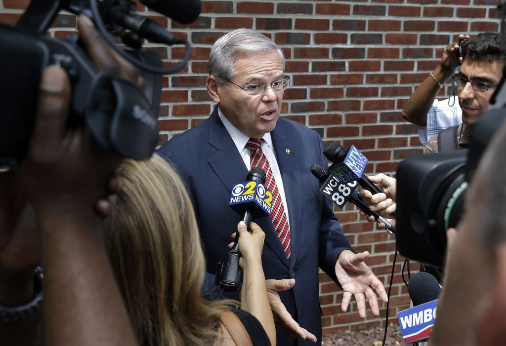 Sen. Robert Menendez, D-N.J., answers a question in Union Township, N.J., Monday, July 27, 2015. The corruption indictment against Menendez is only a few months old, but early court filings pull back the curtain on a legal fight that figures to be bitter, personal and contested at every step. (AP Photo/Mel Evans)