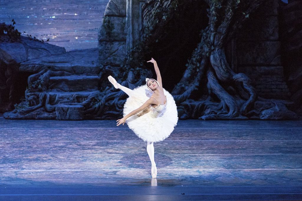 In this Sept. 3, 2014 photo released by ABT, Misty Copeland performs in "Swan Lake,"  at the Queensland Performing Arts Centre in Queensland, Australia. Copeland danced the lead role of Odette/Odile in "Swan Lake" Wednesday, June 24, 2015, for the first time at American Ballet Theatre's home, the Metropolitan Opera House in New York.  (Darren Thomas/ABT via AP)