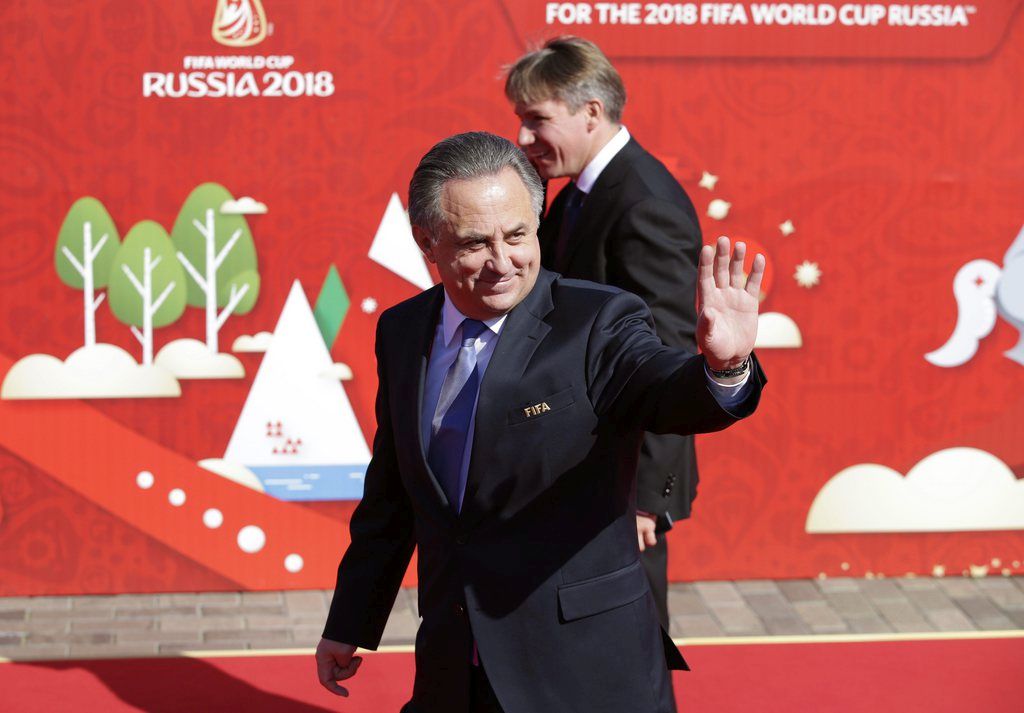 epa04859871 Russian Sports Minister Vitaly Mutko waves as he arrives for the Preliminary Draw of the FIFA World Cup 2018 in St.Petersburg, Russia, 25 July 2015. St.Petersburg is one of the host cities of the FIFA World Cup 2018 in Russia which will take place from 14 June until 15 July 2018.  EPA/TATYANA ZENKOVICH