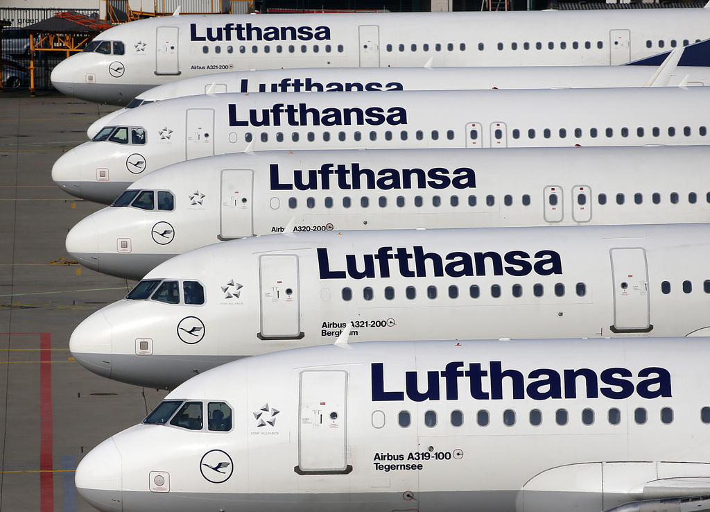 In this April 2, 2014 picture Lufthansa aircrafts are parked as Lufthansa pilots went on a three-days-strike in Frankfurt, Germany. Lufthansa says Thursday, July 30, 2015, that its earnings trebled in the second quarter compared with a year earlier, helped by falling fuel costs. (AP Photo/Michael Probst)