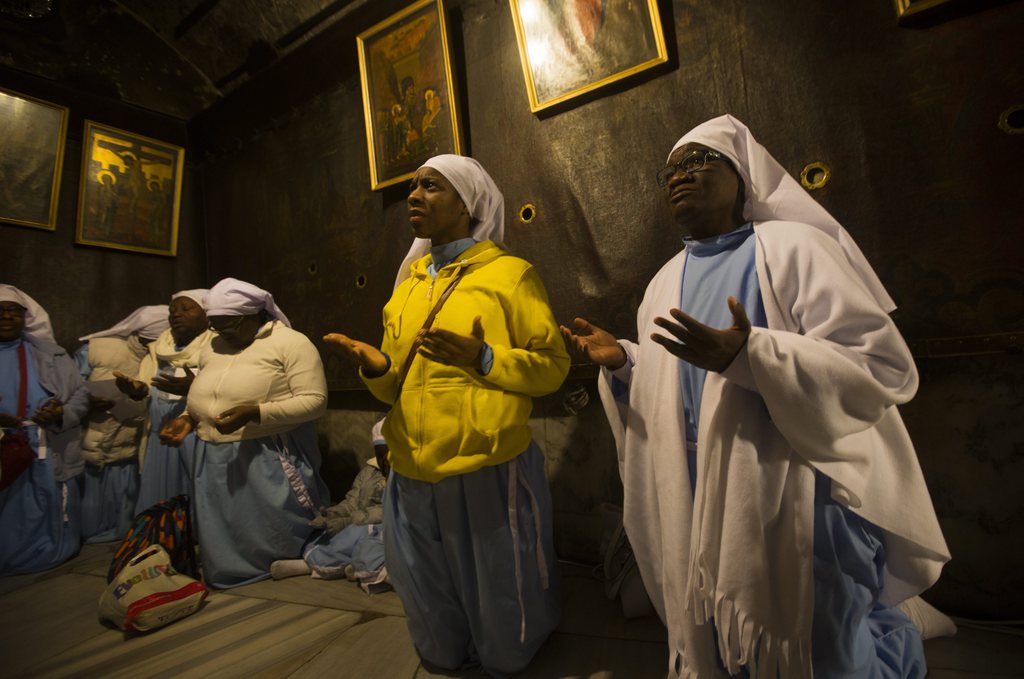 Des pèlerins chrétiens célèbrent Noël au Nigeria. 