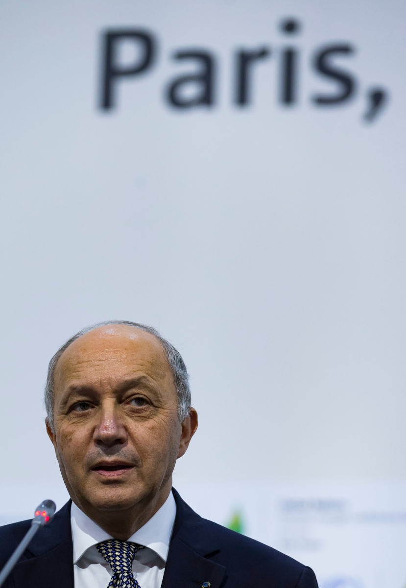 epa05061666 French Foreign affairs minister and acting president of the COP21, Laurent Fabius hosts the 'Committee of Paris' plenary work session at 'the COP21 Climate Conference in Le Bourget, north of Paris, France, 09 December 2015. The 21st Conference of the Parties (COP21) is held in Paris from 30 November to 11 December aimed at reaching an international agreement to limit greenhouse gas emissions and curtail climate change.  EPA/IAN LANGSDON FRANCE COP21