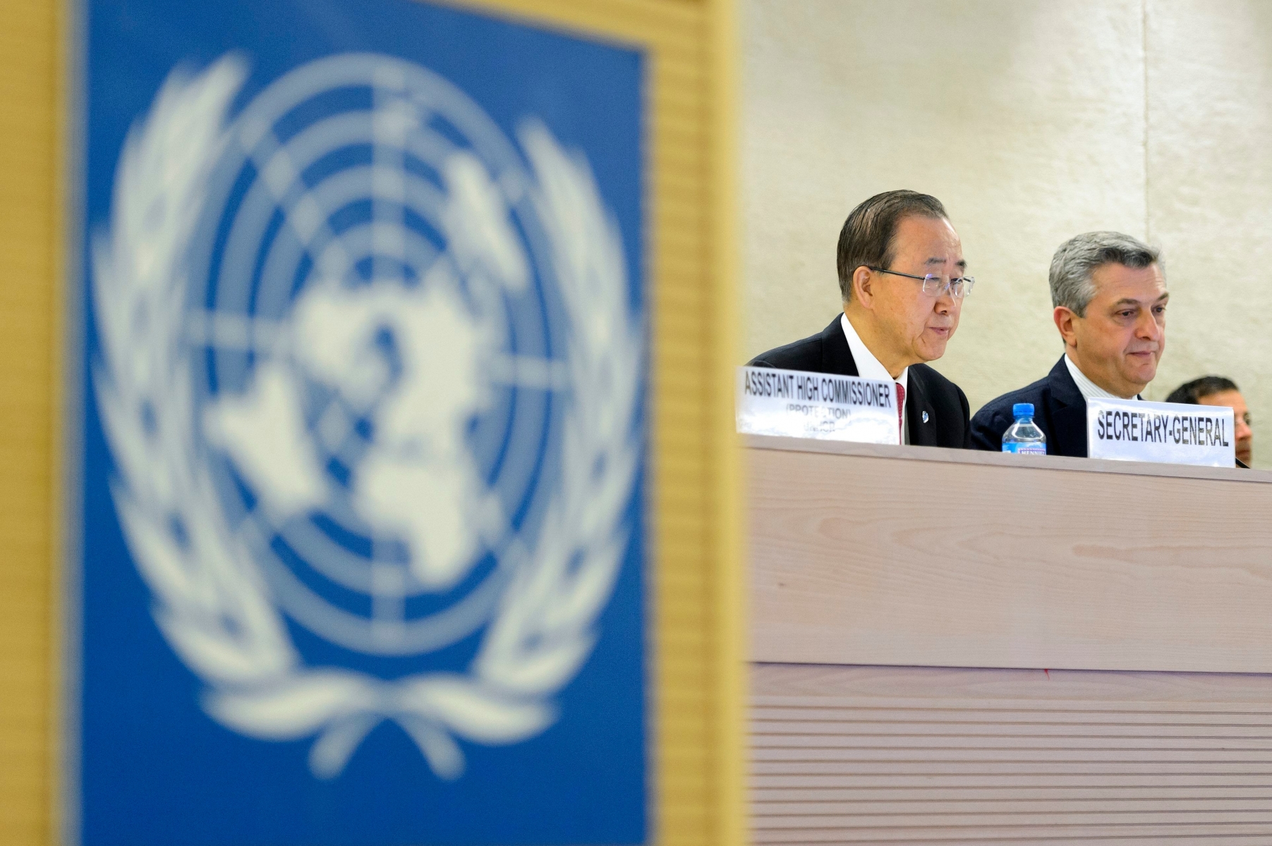 United Nations Secretary-General Ban Ki-moon, left, and United Nations High Commissioner for Refugees, UNHCR, Italian Filippo Grandi, right, listen during the meeting on global responsibility sharing through pathways for admission of Syrian refugees, at the United Nations in Geneva, Switzerland, Wednesday, March 30, 2016. The UNHCR is hosting a high-level Conference in Geneva that will focus on refugees from Syria, and the need to generate a substantial increase in resettlement and other answers for their plight. (KEYSTONE/Martial Trezzini) SWITZERLAND UNHCR REFUGEES SYRIAN
