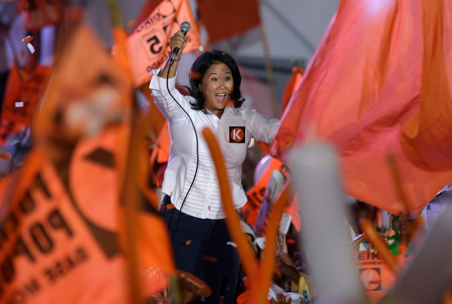 In this Thursday, April 7, 2016 photo, presidential candidate Keiko Fujimori waves at supporters during her closing presidential campaign rally in Lima, Peru. Keiko, the daughter of former President Alberto Fujimori, is the frontrunner in Peru's upcoming April 10 election. (AP Photo/Martin Mejia) The Week That Was in Latin America Photo Gallery