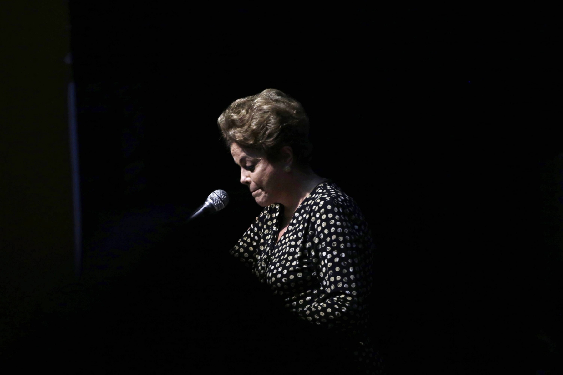 epa05301006 (FILE) A file picture dated 10 May 2016 shows Brazilian President Dilma Rousseff at the opening ceremony of the 4th National Policy Conference on Women in Brasilia, Brazil. The Brazilian Senate on early 12 May 2016 to suspend Rousseff from power as she stands an impeachment trial. Brazil's lower house of Congress voted on 17 April in favor of impeaching Rousseff for allegedly manipulating budget figures to minimize the deficit. Rousseff denies the allegations, insisting the impeachment process is a coup against her.  EPA/FERNANDO BIZERRA JR. FILE BRAZIL CRISIS