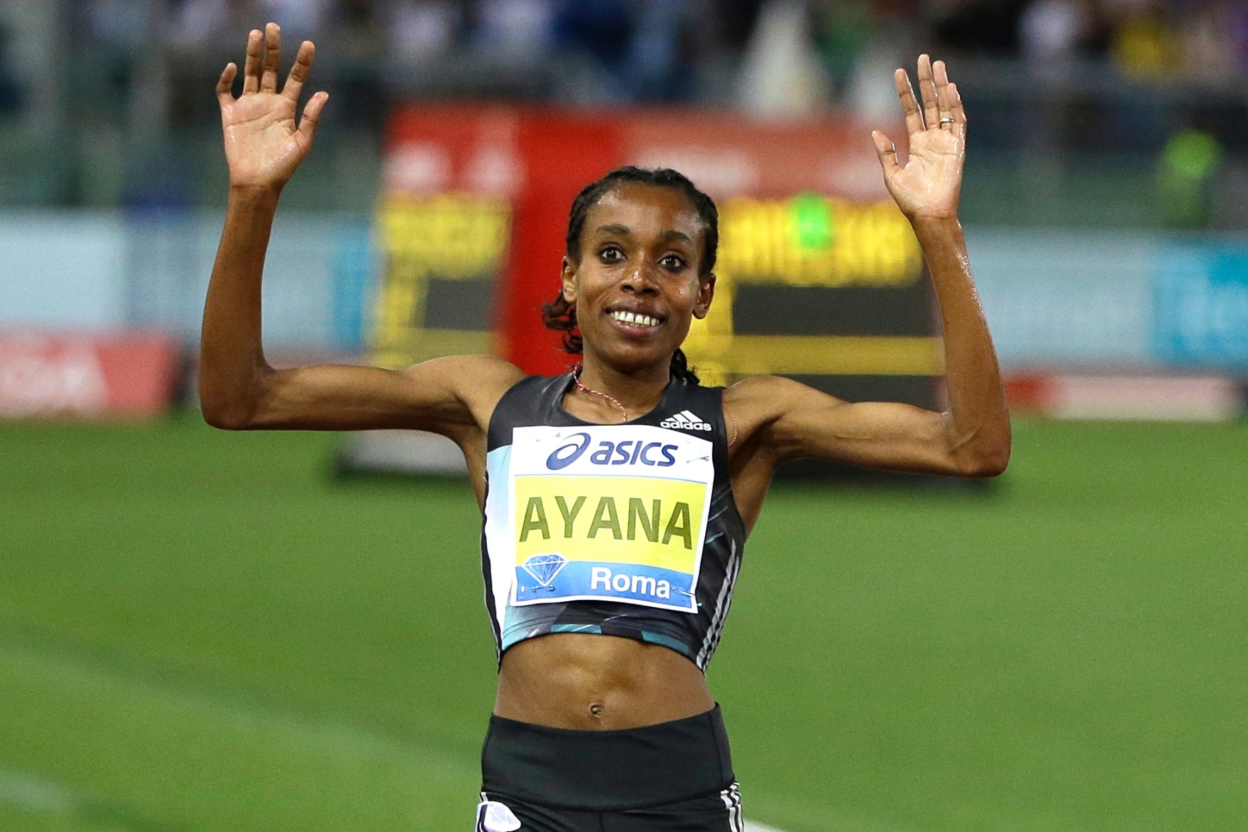 Ethiopia's Almaz Ayana crosses the finish line after winning the women's 5000m event at the Golden Gala IAAF athletic meeting, in Rome's Olympic stadium, Thursday, June 2, 2016. (AP Photo/Gregorio Borgia) Italy Athletics Golden Gala