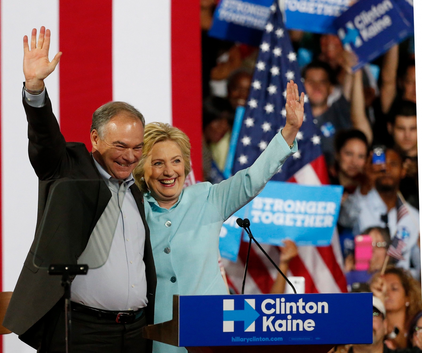 epa05438420 US Democratic presidential candidate Hillary Clinton (R) introduces her Vice Presidential candidate Senator Tim Kaine (L) during a campaign event at Florida International University in Miami, Florida, USA 23 July 2016.  EPA/RHONA WISE USA ELECTIONS CLINTON
