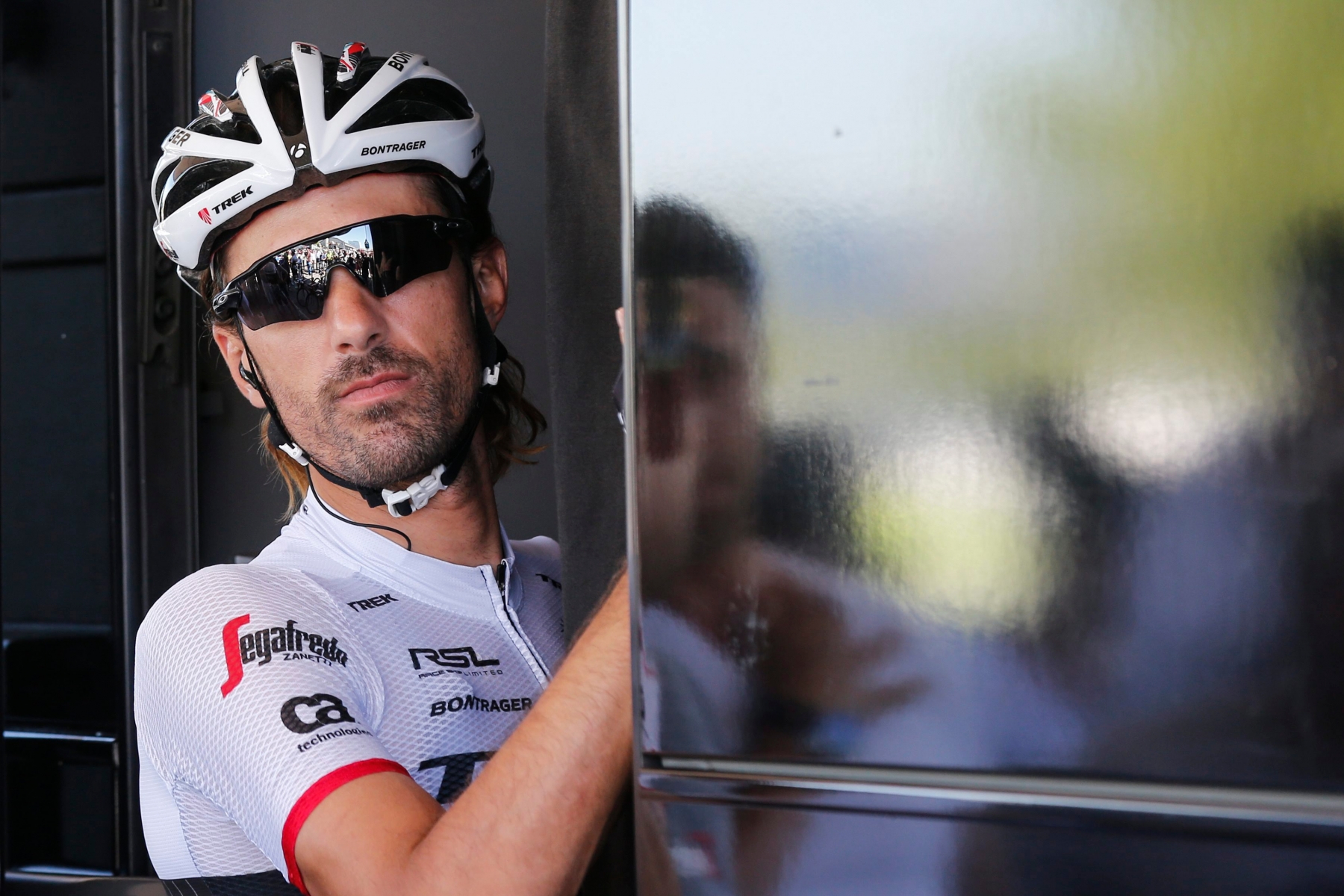 epa05433222 Switzerland's Fabian Cancellara looks out of the team bus prior to the start of the 17th stage of the 103rd edition of the Tour de France cycling race over 184 km between Bern and Finhaut-Emosson in Switzerland in Bern, Switzerland, 20 July 2016.  EPA/PETER KLAUNZERd SWITZERLAND TOUR DE FRANCE 2016