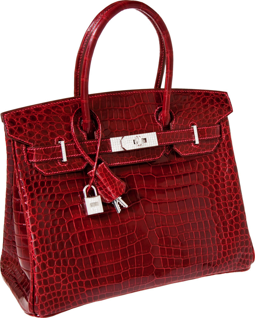 This product image provided by Heritage Auctions shows an Herm?s Diamond Birkin handbag that sold for $203,525 in an auction that ended Tuesday, Dec. 6, 2011, in Dallas. Heritage spokesman Noah Fleisher said the bag, made of crocodile hide and featuring 18-karat white gold, diamond-encrusted hardware, went to a collector who wished to remain anonymous. (AP Photo/Heritage Auctions)
