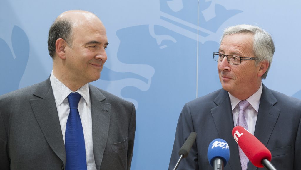 Le ministre français des Finances Pierre Moscovici (gauche) et le Premier ministre luxembourgeois et président de l'Eurogroupe Jean Claude Juncker.