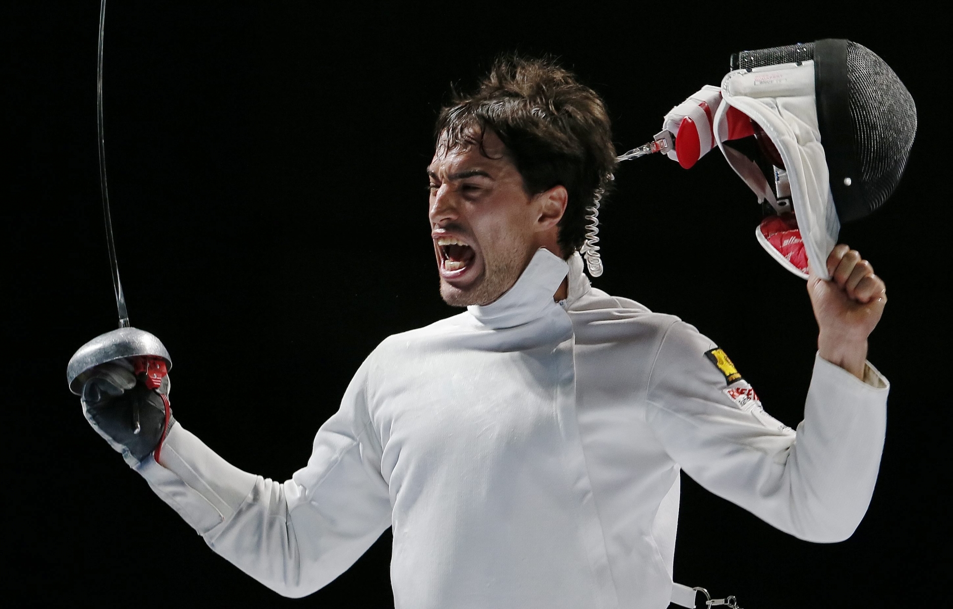 epa04852455 Max Heinzer of Switzerland reacts after his victory over Santarelli of Italy during their Men Epee Team semi final match for the World Fencing Championship in Moscow, Russia, 18 July 2015.  EPA/SERGEI ILNITSKYe FECHTEN WM 2015 MOSKAU
