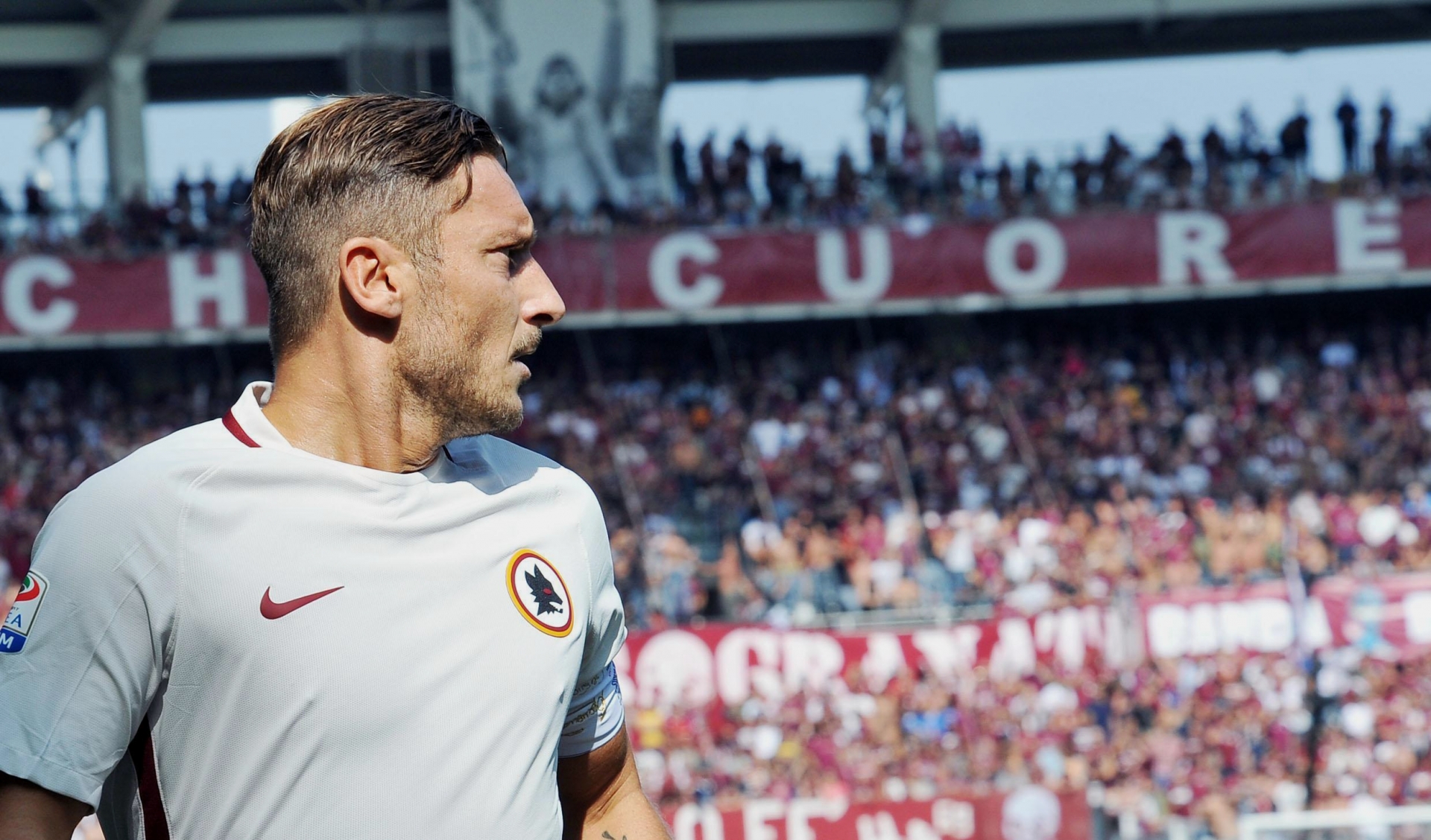 Roma's Francesco Totti walks on the pitch during a Serie A soccer match between Roma and Torino at the Turin Olympic stadium, Italy, Sunday, Sept. 25, 2016. (Alessandro Di Marco/ANSA via AP) Italy Soccer Serie A