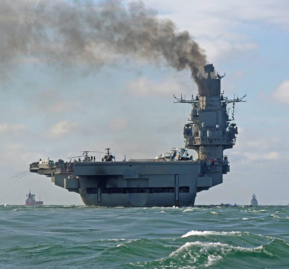 epa05596278 A handout photograph made available by Dover Marina.com on 21 October 2016 showing Russian aircraft carrier Admiral Kuznetsov in the English Channel, 21 October 2016. The Russian Task Group, which includes the sole Russian aircraft carrier, Admiral Kuznetsov, the nuclear powered Kirov Class Battlecruiser, Pyotr Velikiy and two Udaloy Class Destroyers, Vice Admiral Kulakov and Severomorsk sailed from Russia on Saturday 15 October to join the Russian anti-Daesh military operations in Syria.  EPA/DOVER MARINA.COM / HANDOUT MANDTAORY CREDIT: DOVER MARINA.COM HANDOUT EDITORIAL USE ONLY/NO SALES AT SEA ENGLISH CHANNEL RUSSIAN NAVY CARRIER TASK FORCE