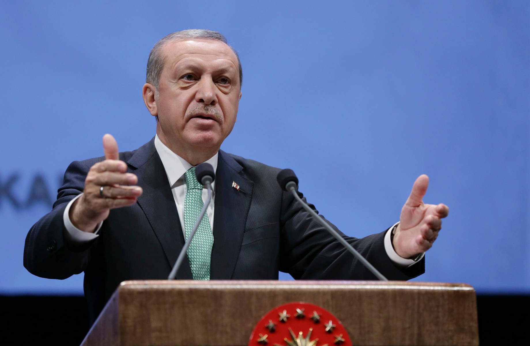 Turkey's President Recep Tayyip Erdogan addresses a meeting at his palace in Ankara, Turkey, Thursday, Nov. 3, 2016. Erdogan has harshly criticized Germany, accusing it of supporting terrorism and slamming comments suggesting Berlin may not extradite suspects wanted by Turkey if it considers the case is politically motivated. (Murat Cetinmuhurdar/Pool photo via AP) Turkey Germany