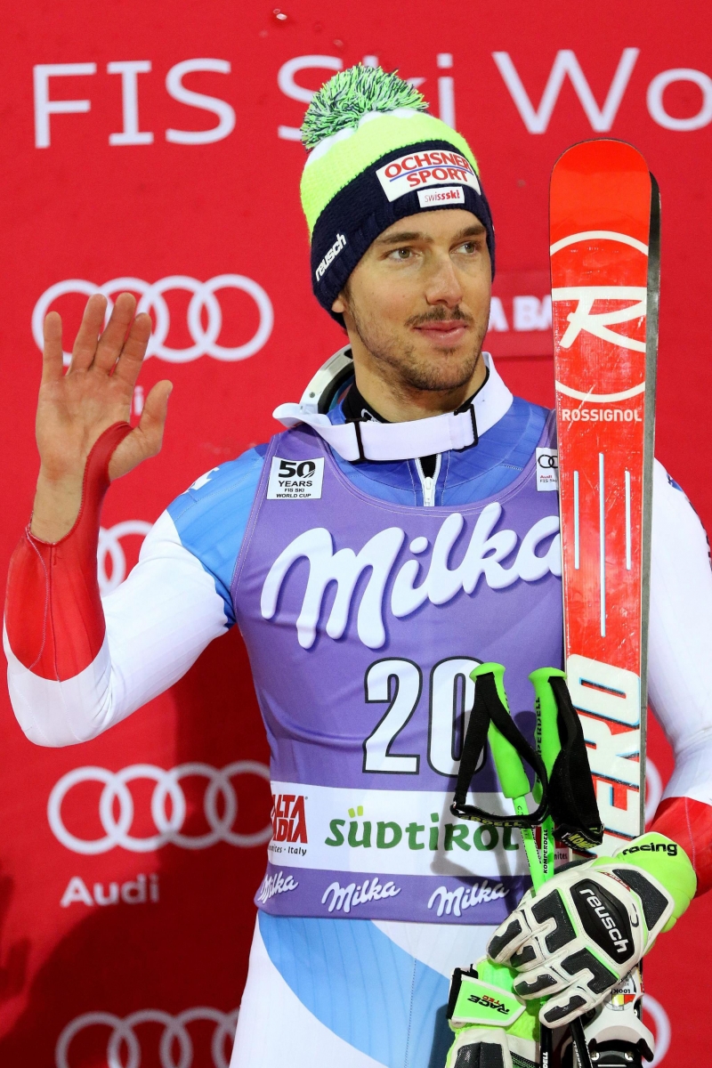 epa05682663 Carlo Janka of Switzerland celebrates his second place on the podium after the Men's Parallel Giant Slalom race at the FIS Alpine Skiing World Cup event in Alta Badia, Italy, 19 December 2016. Sarrazin won ahead second placed Carlo Janka of Switzerland, and third placed Kjetil Jansrud.  EPA/ANDREA SOLERO ITALY ALPINE SKIING WORLD CUP