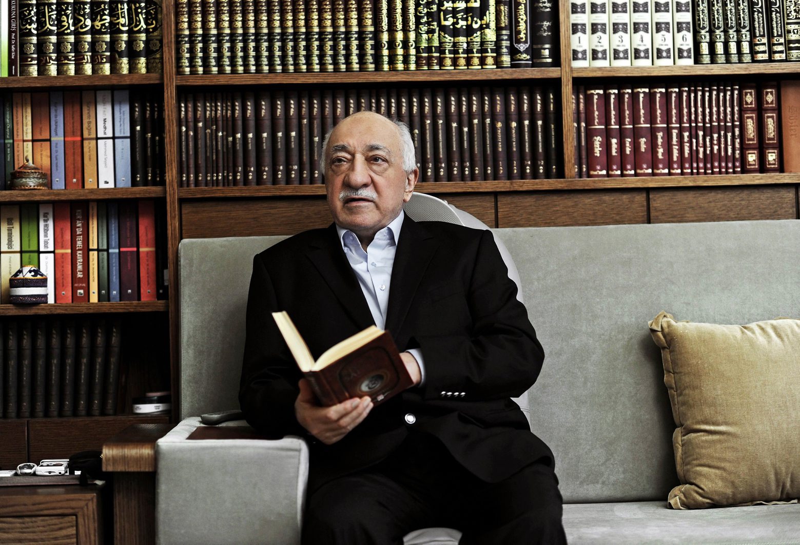 In this March 15, 2014 photo, Turkish Muslim cleric Fethullah Gulen, sits at his residence in Saylorsburg, Pennsylvania, United States. A U.S.-based Muslim cleric, who has become Turkish President Recep Tayyip Erdogan's chief foe, went on trial in absentia in Istanbul on Wednesday, Jan. 6, 2016 accused of attempting to overthrow the government by instigating corruption probes in 2013 that targeted people close to the Turkish leader.  Gulen and 68 other people, including former police chiefs, have been charged with "attempting to overthrow the Turkish republic through the use of violence,î leading a terrorist organization and "political espionage." Prosecutors are seeking life imprisonment for Gulen and others. (AP Photo/Selahattin Sevi) USA ISLAM FETHULLAH GUELEN