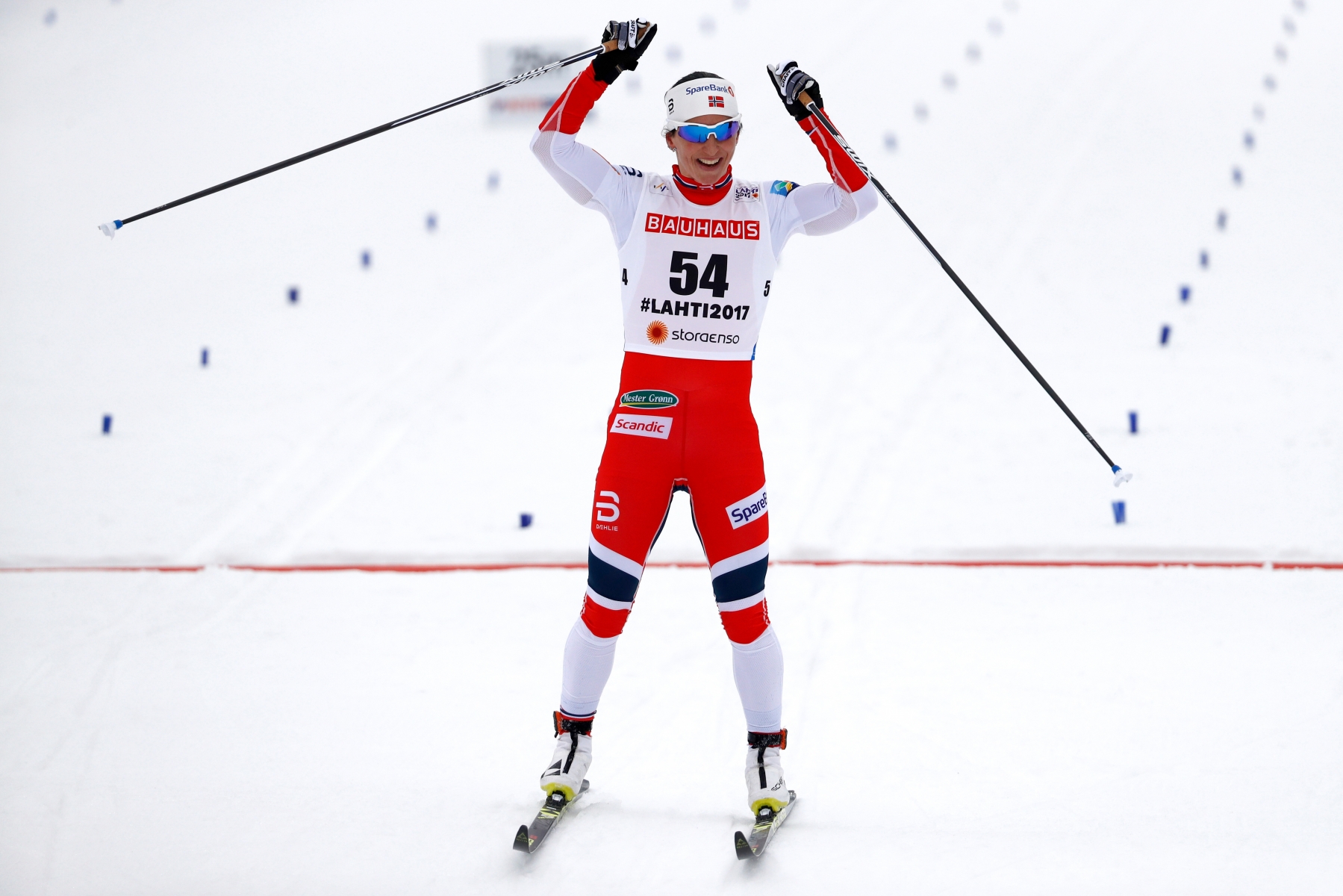 Gold medal winner Marit Bjoergen of Norway celebrates winning the women's cross country skiing 10 km Individual Classic at the 2017 Nordic Skiing World Championships in Lahti, Finland, on Tuesday, February 28, 2017. (KEYSTONE/Peter Klaunzer) FINLAND NORDIC SKIING WORLDS 2017 LAHTI CROSS COUNTRY SKIING SPR