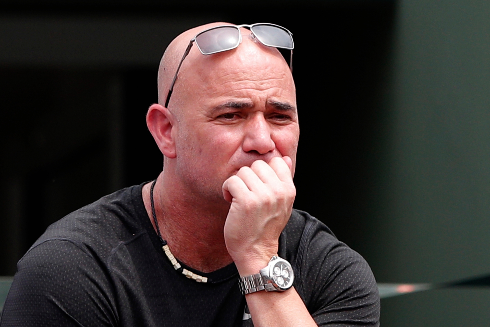 Serbia's Novak Djokovic's coach Andre Agassi of the U.S. watches the match against Spain's Marcel Granollers during their first round match of the French Open tennis tournament at the Roland Garros stadium, in Paris, France. Monday, May 29, 2017. (AP Photo/Christophe Ena) France Tennis French Open