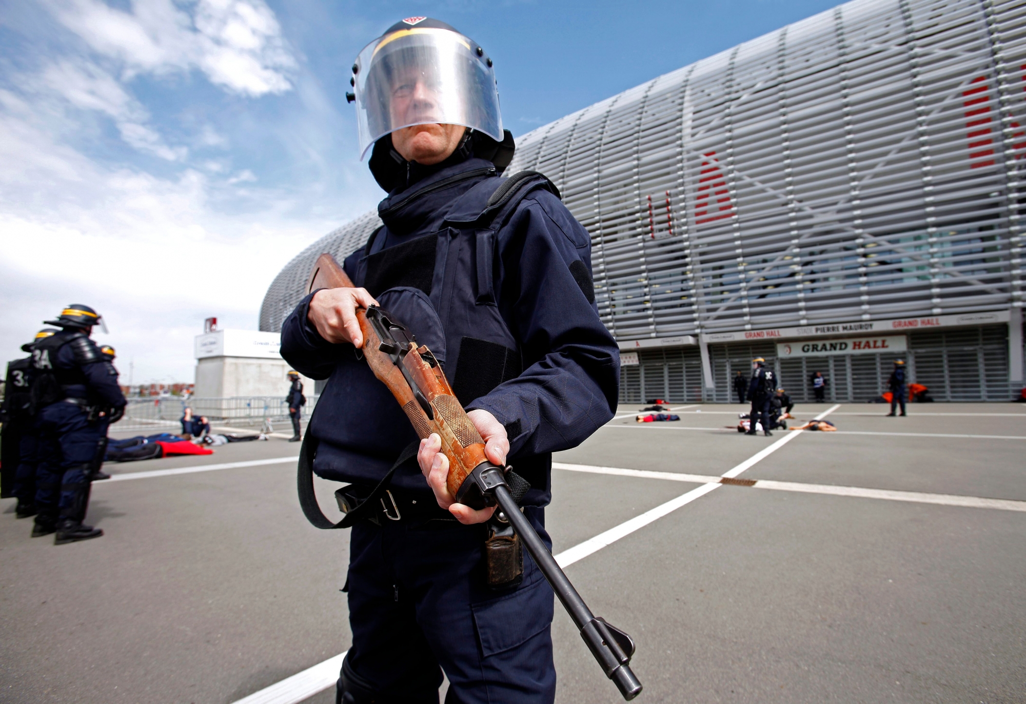Police officers take part in a security exercise at the Pierre Mauroy Stadium, Villeneuve d'Ascq, northern France, Thursday April 21, 2016. France's government is calling for a two-month extension of the state of emergency that was declared after the deadly Nov. 13 attacks in Paris, the country's prime minister said Wednesday. Following attacks in Brussels last month, concerns have been raised that Euro 2016 could be targeted, especially the fan zones where spectators gather to watch games on large screens. (AP Photo/Michel Spingler) FUSSBALL EURO 2016 SICHERHEIT