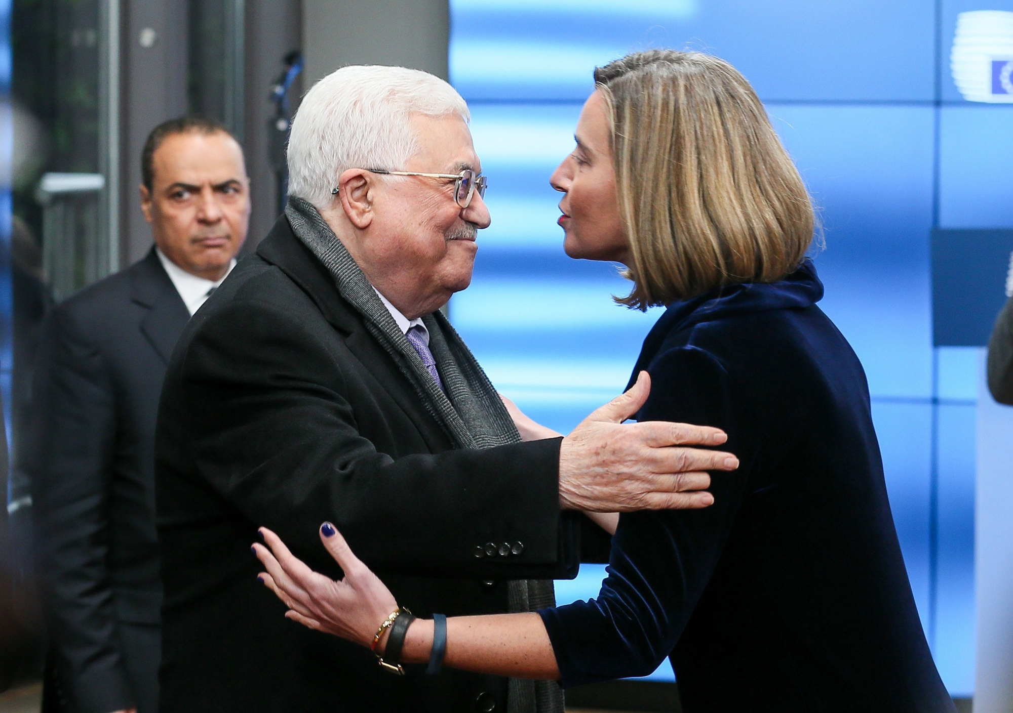 epa06464737 The Palestinian President Mahmoud Abbas (L) is welcomed by EU High Representative for Foreign Affairs Federica Mogherini (R) prior to a meeting at the EU Council in Brussels, Belgium, 22 January 2017.  EPA/STEPHANIE LECOCQ BELGIUM EU PALESTINE DIPLOMACY