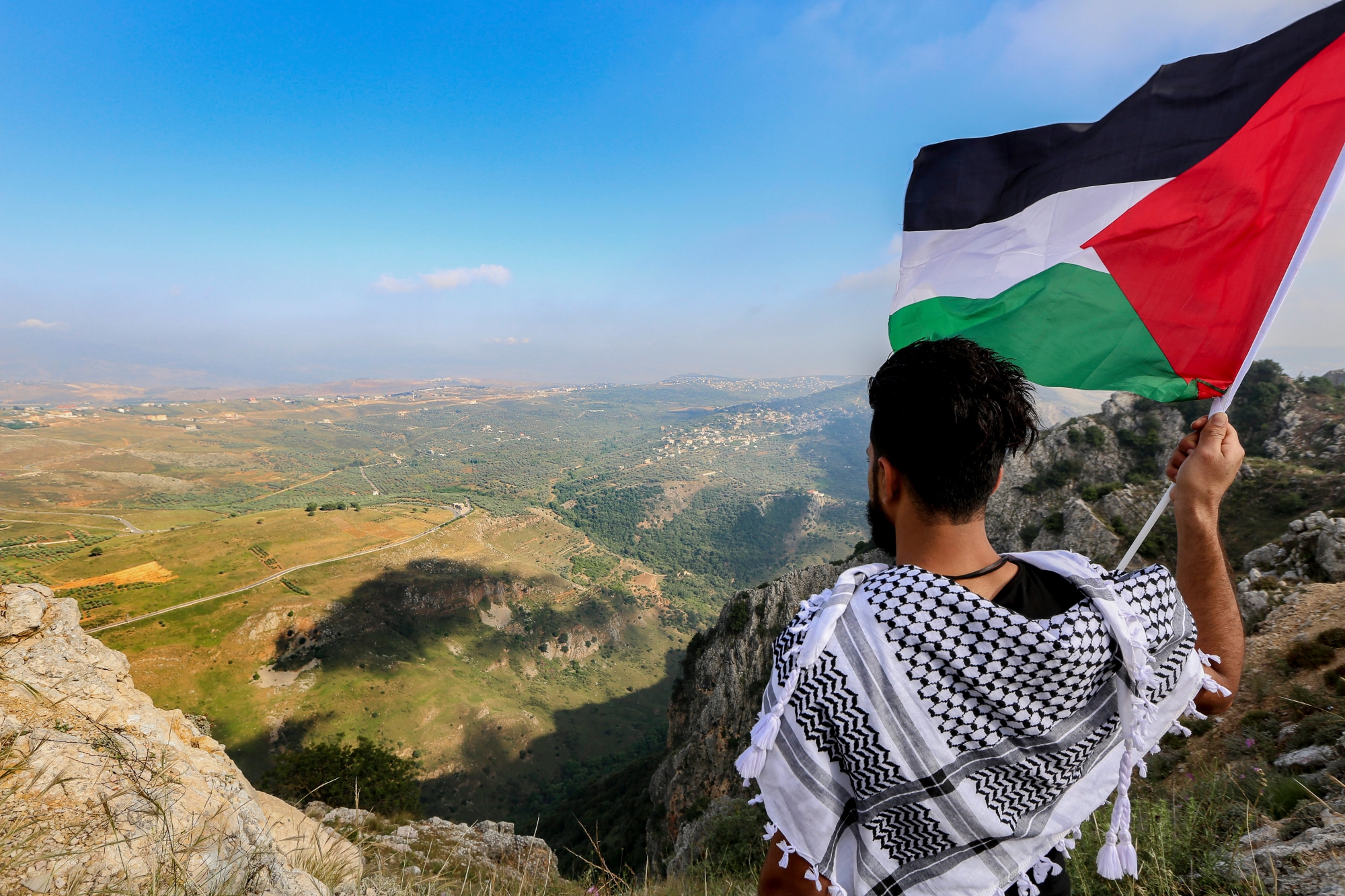 epa06739539 Palestinian refugees wave their national flags and chant slogans against Israeli occupation during the 70th anniversary of the Nakba, in al-Chkif Castle, near the border with Palestine, South Lebanon, 15 May 2018. Palestinians from all their camps of Lebanon marched to south Lebanon to mark the 70th anniversary of Nakba Day (Day of the Catastrophe) on 15 May to commemorate the expulsion of more than 700,000 Palestinians from their land in the war surrounding the establishment of the state of Israel.  EPA/NABIL MOUNZER LEBANON PALESTINE NAKBA COMMEMORATE