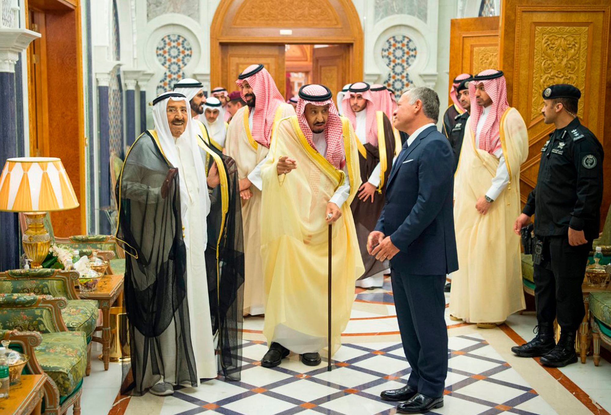 In this photo released by Saudi Press Agency, SPA, Saudi King Salman, center, receives Jordan's King Abdullah II, front right, and Emir of Kuwait, Sheikh Sabah Al Ahmad Al Sabah, left, in Mecca, Saudi Arabia, Monday, June 11, 2018. Three Gulf Arab states pledged  billion in aid to Jordan on Monday, an effort to stabilize the U.S.-allied kingdom as it faces its worst protests in years over government austerity plans that included tax increases. (Saudi Press Agency via AP) Jordan Economy
