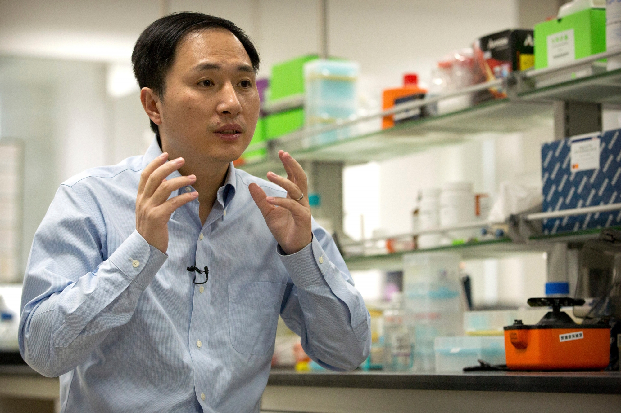 In this Oct. 10, 2018 photo, He Jiankui speaks during an interview at a laboratory in Shenzhen in southern China's Guangdong province. Chinese scientist He claims he helped make world's first genetically edited babies: twin girls whose DNA he said he altered. He revealed it Monday, Nov. 26, in Hong Kong to one of the organizers of an international conference on gene editing. (AP Photo/Mark Schiefelbein) Genetic Frontiers Gene Edited Babies