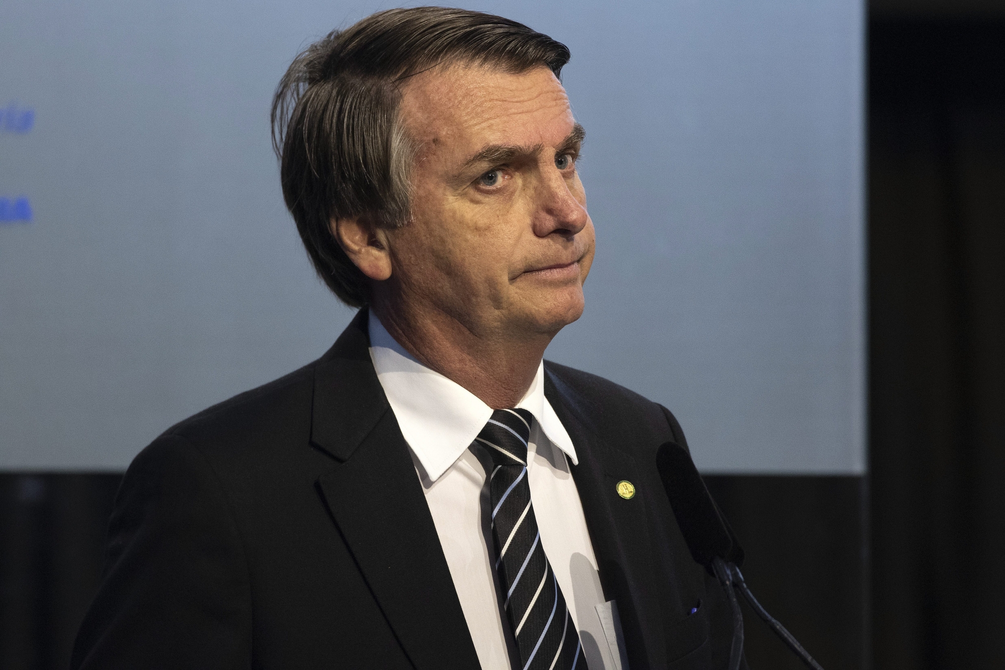 epa06864331 The far-right Jair Bolsonaro, who leads by narrow margin the polls for next October's elections in Brazil, participates in a business meeting organized by the National Confederation of Industry (CNI), in Brasilia, Brazil, 04 July 2018. Six of the leading candidates for the Presidency of Brazil appear today before a business forum, ahead of the general elections in October 2018.  EPA/Joédson Alves BRAZIL ELECTIONS