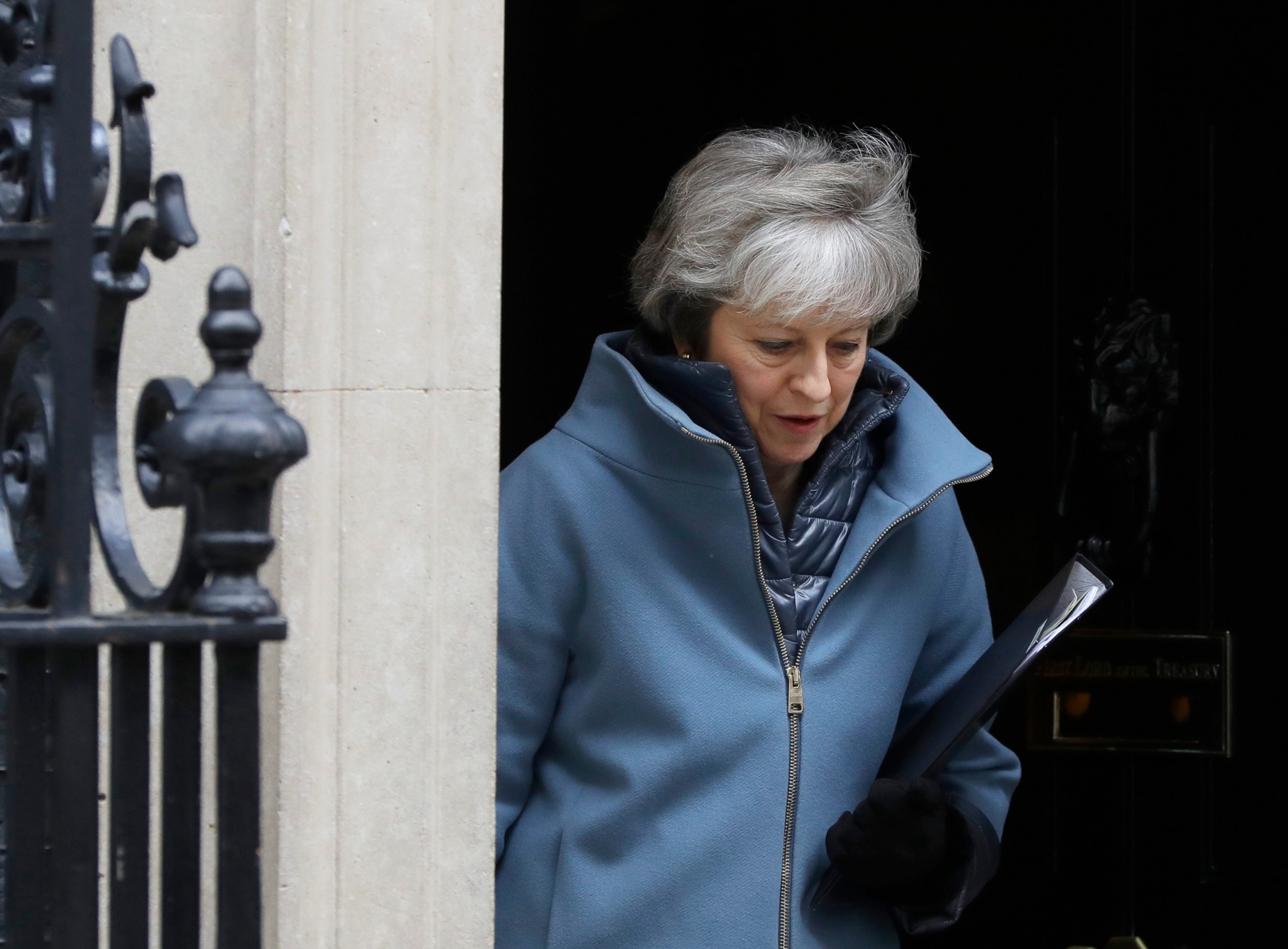Britain's Prime Minister Theresa May leaves 10 Downing Street in London, Tuesday, Feb. 12, 2019. May is expected to address Parliament on Brexit later Tuesday, followed by a debate. (AP Photo/Kirsty Wigglesworth) Britain Brexit