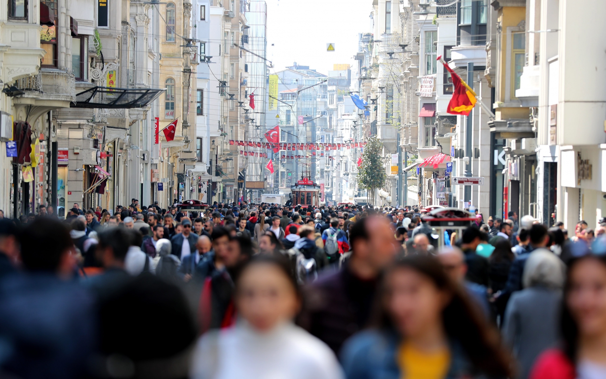 epa07478173 People walk at Istiklal Street in Istanbul, Turkey, 01 April 2019. According to media reports, Supreme Election Board (YSK) chairman said on 01 April Turkey's opposition Republican People's Party (CHP) candidate for Istanbul mayor Ekrem Imamoglu is leading by nearly 28,000 votes after the local election. Some 57 million people voted in local elections in Turkey's capital and the country's overall 81 provinces.  EPA/TOLGA BOZOGLU TURKEY LOCAL ELECTIONS