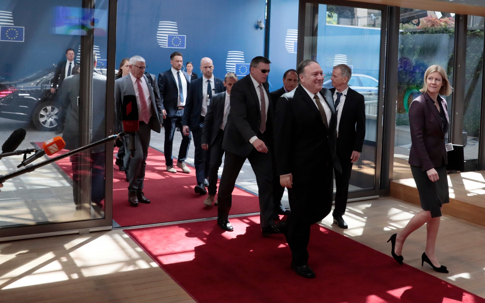 U.S. Secretary of State Mike Pompeo, center, arrives for a meeting with European foreign ministers at the Europa building in Brussels, Monday, May 13, 2019. The EU backers of the Iran nuclear deal meet with U.S. Secretary of State Mike Pompeo to discuss ways to keep the pact afloat. (AP Photo/Virginia Mayo) Belgium EU Iran