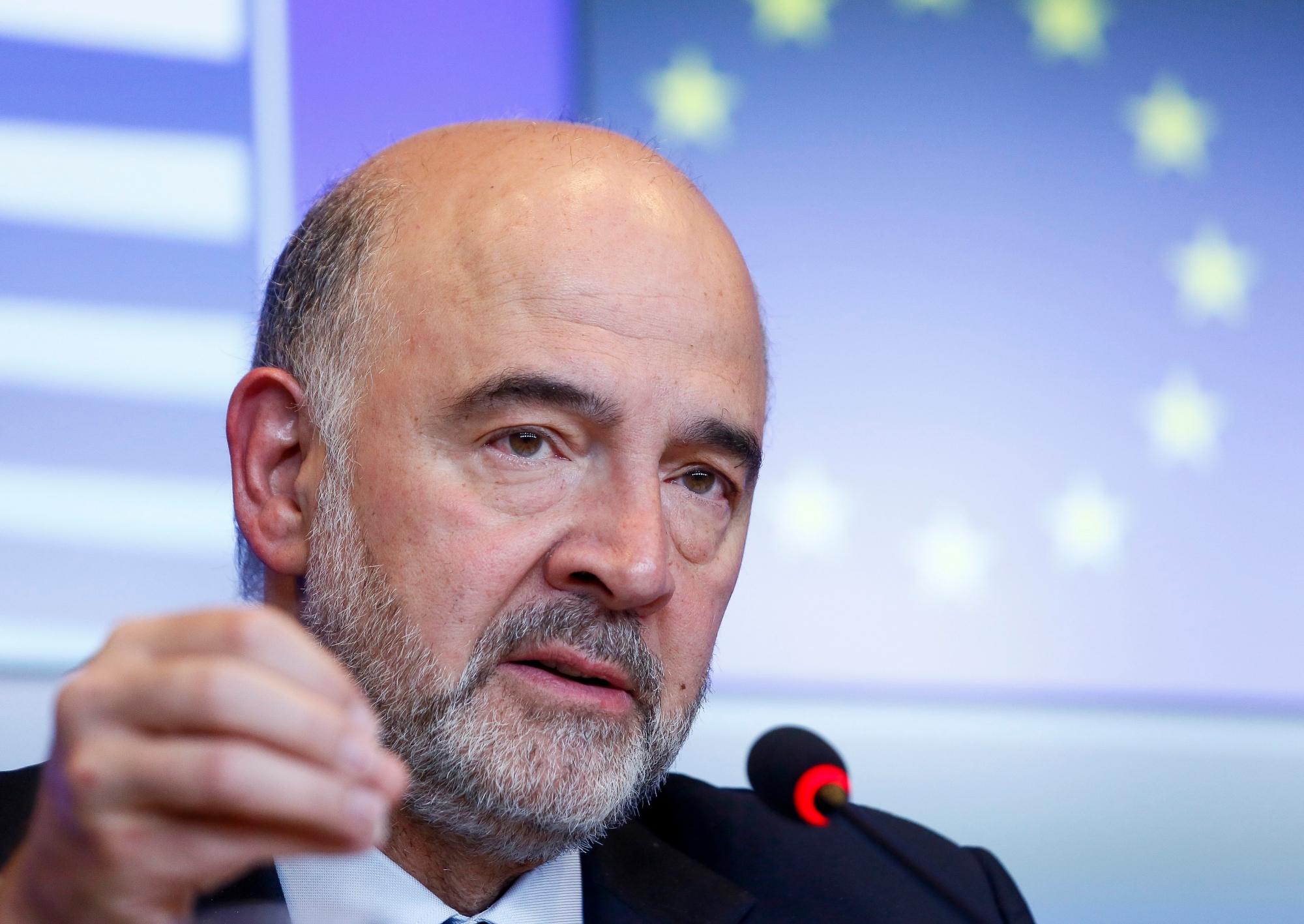 epa07647219 Pierre Moscovici, the European Commissioner for Economic and Financial Affairs and Taxation holds a joint news conference on the Eurogroup meeting in Luxembourg, 14 June 2019. Media reports European finance ministers agreed on the outline of a budget for the euro area.  EPA/JULIEN WARNAND LUXEMBOURG EU EUROGROUP