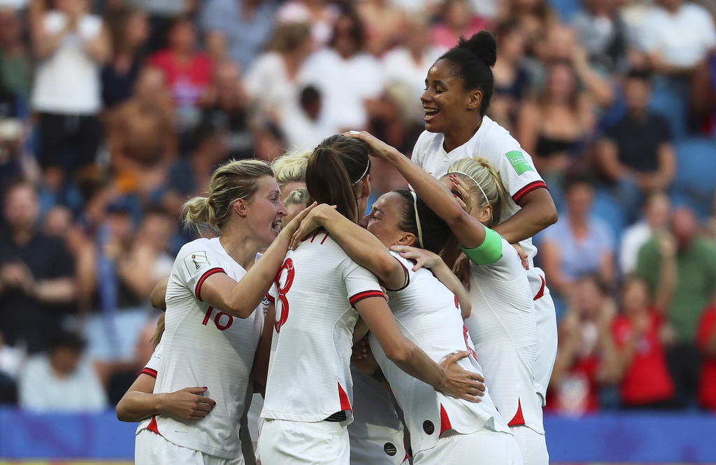 epa07678096 England players celebrate their opening goal during the FIFA Women's World Cup 2019 quarter final match between Norway and England in Le Havre, France, 27 June 2019. EPA/SRDJAN SUKI
