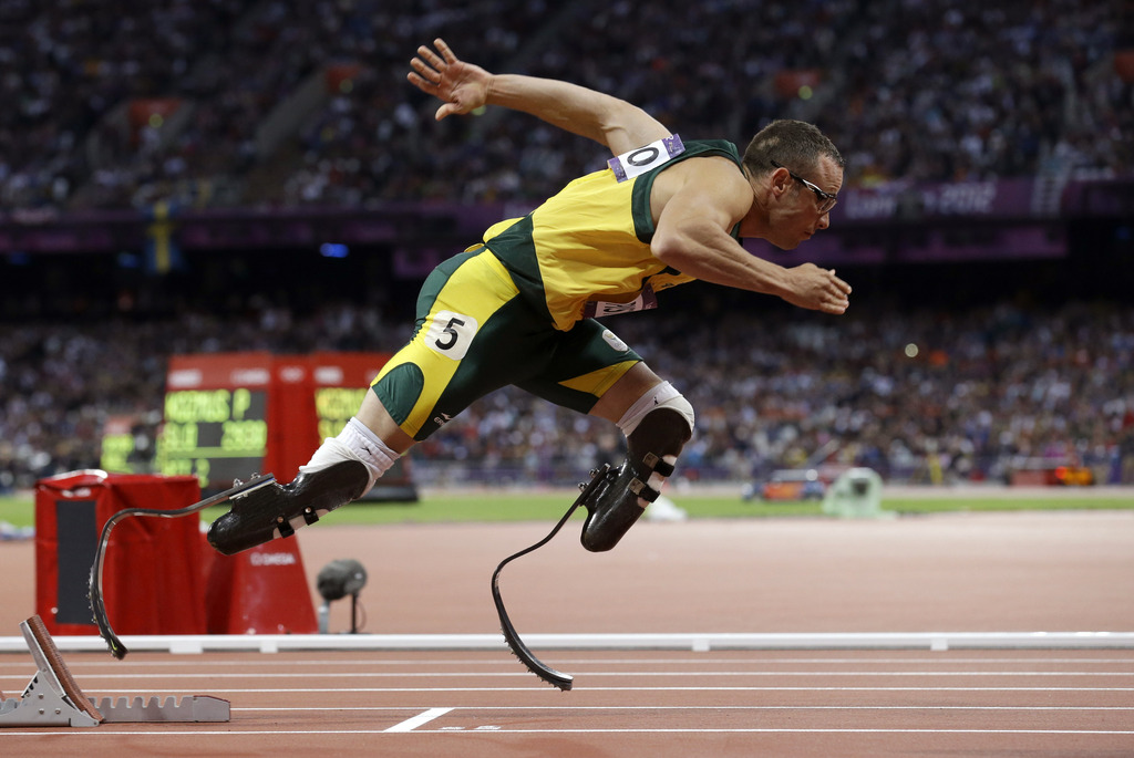 FILE - In this Aug.  5, 2012 file photo, South Africa's Oscar Pistorius starts in the men's 400-meter semifinal during the athletics in the Olympic Stadium at the 2012 Summer Olympics in London. Paralympic superstar Oscar Pistorius was charged Thursday, Feb. 14, 2013, with the murder of his girlfriend who was shot inside his home in South Africa, a stunning development in the life of a national hero known as the Blade Runner for his high-tech artificial legs.  Reeva Steenkamp, a model who spoke out on Twitter against rape and abuse of women, was shot four times in the predawn hours in the home, in a gated community in the capital, Pretoria, police said. (AP Photo/Anja Niedringhaus, File)